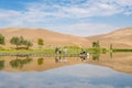 Badain Jaran Desert with lake and reflection Royalty Free Stock Photo