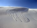 Sand dunes against deep blue sky Royalty Free Stock Photo