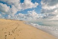 Sand dunes on the beach and beautiful cloudy sky, Royalty Free Stock Photo