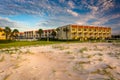 Sand dunes and beachfront hotel at St. Augustine Beach, Florida.