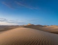 Sand dunes in the desert with clear blue sky landscape