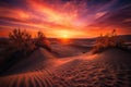 sand dunes glowing orange and red in magical sunset Royalty Free Stock Photo