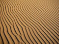 Sand dunes in Morocco, desert landscape, sand texture, tourist camp for night stay, panorama view of sunset over Sahara Royalty Free Stock Photo