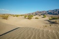 Sand dunes and mountains in Death Valley National Park, beautiful blue sky Royalty Free Stock Photo