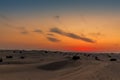 Sand dunes and a night sky after sunset in the desert outside Dubai, UAE Royalty Free Stock Photo