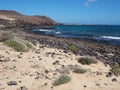 Sand dunes and rocky shore on La Graciosa, Canary Islands Royalty Free Stock Photo