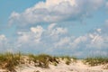 Sand dunes, sea oats and a beautiful sky. Royalty Free Stock Photo