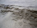 Sandy slope eroding on a beach