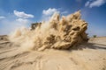 sand explosion, with debris and sand flying in all directions, during mining operation