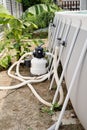 Sand filter plant at a pool in the backyard Royalty Free Stock Photo