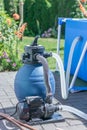 Sand filter with pump on a pool to keep the pool water clean Royalty Free Stock Photo