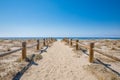 Sand footpath with wooden banisters in nature to Cabo de Gata Beach in Almeria