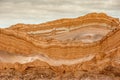 Sand formations, mountains, rocks at Valle de la Luna Moon Valley, San Pedro de Atacama Chile. Wide view of stunning sun rise on Royalty Free Stock Photo