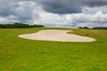 Sand golf bunker on a empty golf course Royalty Free Stock Photo