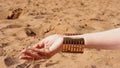 Sand Grains Run Through Female Hands. Woman Holding and Releasing Sand Through Fingers.
