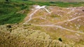 Sand hills on the south coast of Ireland in summer, top view. Irish coastal dunes, aerial view
