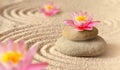 Sand, lily and spa stones in zen garden Royalty Free Stock Photo