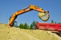 Sand loading in a dump-body truck