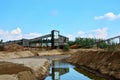 Sand making plant in mining quarry. Crushing factory with production line for crushing, grinding stone, sorting sand and bulk Royalty Free Stock Photo