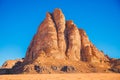Sand mountain The Seven Pillars of Wisdom against the blue sky, Jordan, Wadi RAM desert Royalty Free Stock Photo