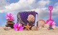 Sand Pail With Net and Sea Shells on Sand With Sky Background Royalty Free Stock Photo