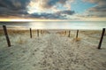 Sand path to North sea beach at sundown Royalty Free Stock Photo