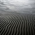 Sand patterns create mesmerizing uniform ripples across a beach Royalty Free Stock Photo