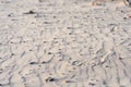 Sand patterns with human footprints in Juan Lacaze's Beach, Colonia, Uruguay
