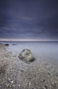 Sand plains with shells and large boulders at low tide. The Wadden Sea near Moddergat, Paesens, the Netherlands. UNESCO World