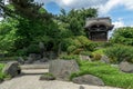 Sand and plants next to temple