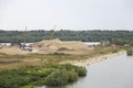 Sand quarry on the shore of Danube river Royalty Free Stock Photo