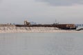 Sand replenishment ship on shore for land reclamation