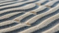 Of sand ripples on a beach showcasing natural patterns formed by the Royalty Free Stock Photo