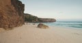 Sand rock coast waves washed in slow motion aerial view. Nobody tropic landscape of cliff shore