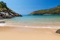 Sand and rock view of Nai Harn Beach Royalty Free Stock Photo