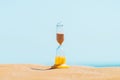Sand running through an old hourglass measuring passing time and counting down to a deadline Royalty Free Stock Photo