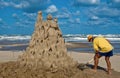 Sand sculptor at work on beach Royalty Free Stock Photo