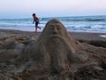 Sand sculpture and boy Royalty Free Stock Photo