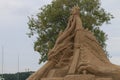 Sand sculpture - chained dragon. Left view Royalty Free Stock Photo