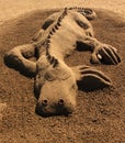 Sand sculpture dragon Royalty Free Stock Photo