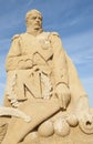 Sand sculpture of emperor napoleon against blue sky