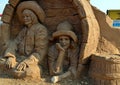 Sand Sculpture Festival. Composition `The Adventures of Huckleberry Finn` Royalty Free Stock Photo