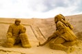 Sand sculptures of hockey players from the past and modern in the town Imatra Finlandand Royalty Free Stock Photo