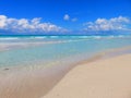 Sand, sea, sky e cloudy... tropical beach with small waves. Enjoy your time! Royalty Free Stock Photo