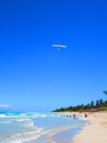 Sand, sea, sky e cloudy... tropical beach with small waves. Enjoy your time! Royalty Free Stock Photo