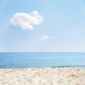 Sand and sea under cloud in blue sky Royalty Free Stock Photo