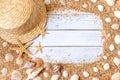 Sand seashells background. Summer time concept with sea shells and starfish on wooden background and sand Royalty Free Stock Photo