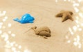 Sand shape made by whale mold on summer beach Royalty Free Stock Photo