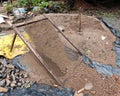 Sand Sieving Using Mesh Frame at Construction Site Royalty Free Stock Photo