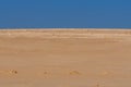 Sand And Sky On Beach On Ilha Deserta Portugal